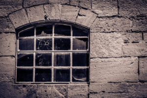 window-with-bullet-hole